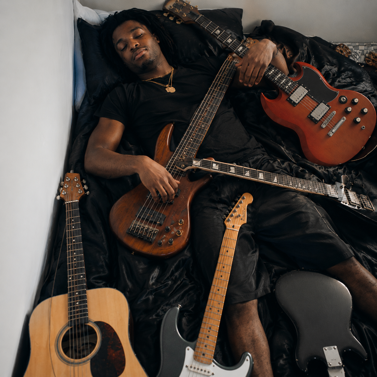 Rion Zion with a guitar